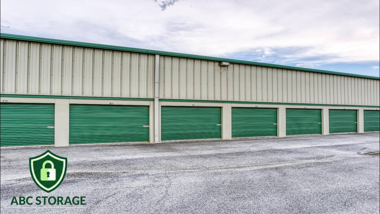 Secure storage facility entrance with gated access and surveillance cameras