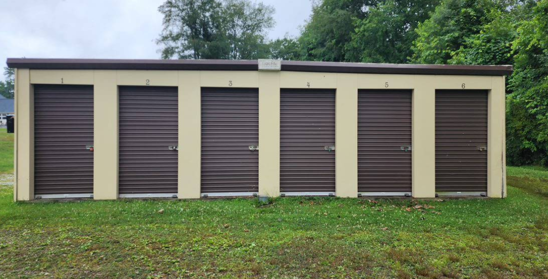 Clean, well-lit drive-up storage aisle that helps Franklin renters pack the square footage they rented