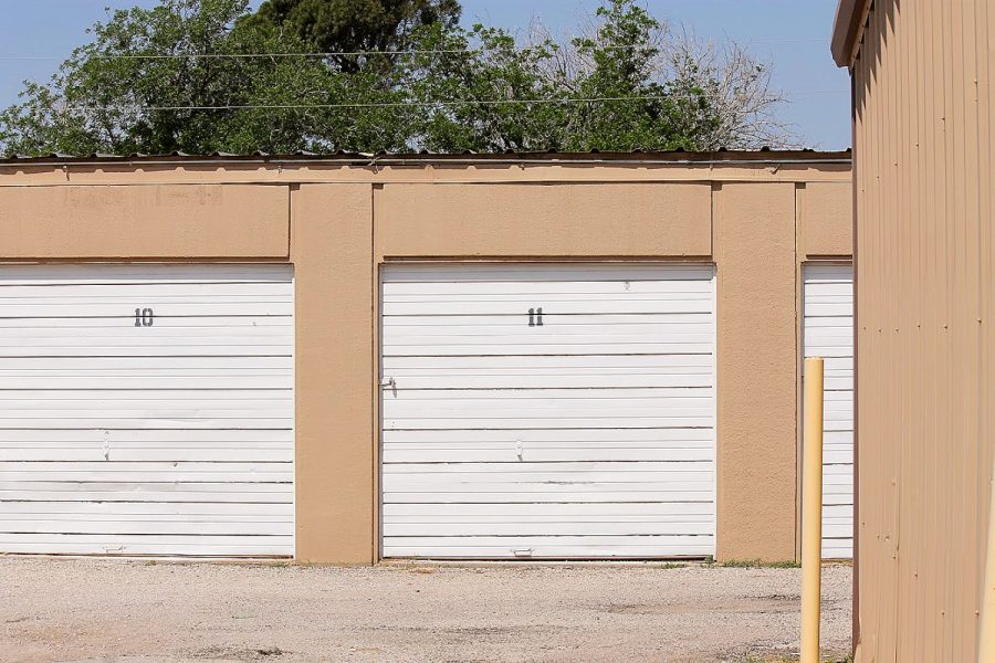 Fenced perimeter, keypad gate, and well-lit drive aisle at Presto Storage in Odessa, Texas