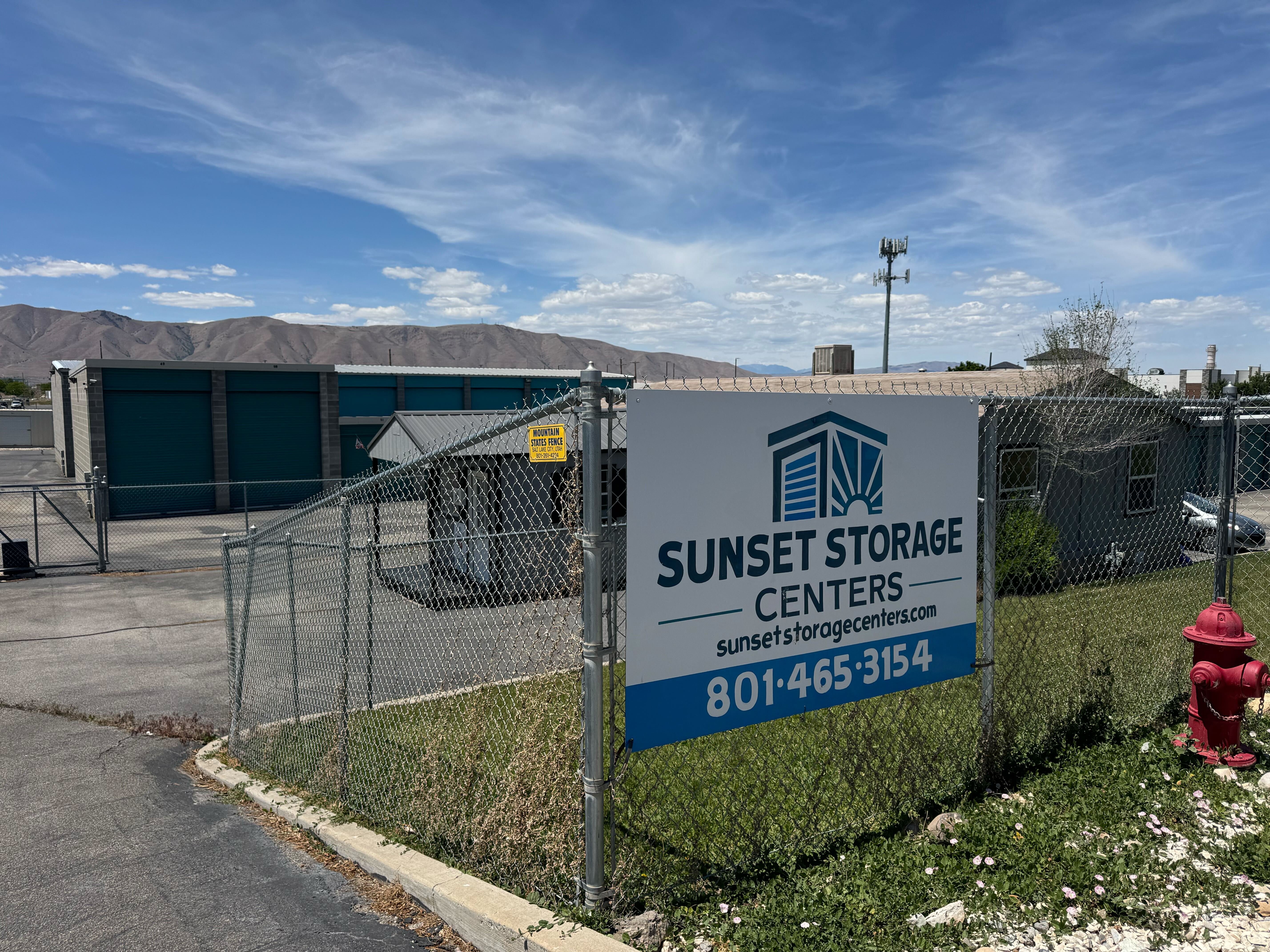 Fenced facility with coded gate and lit drive aisles at Sunset Storage Centers in Payson