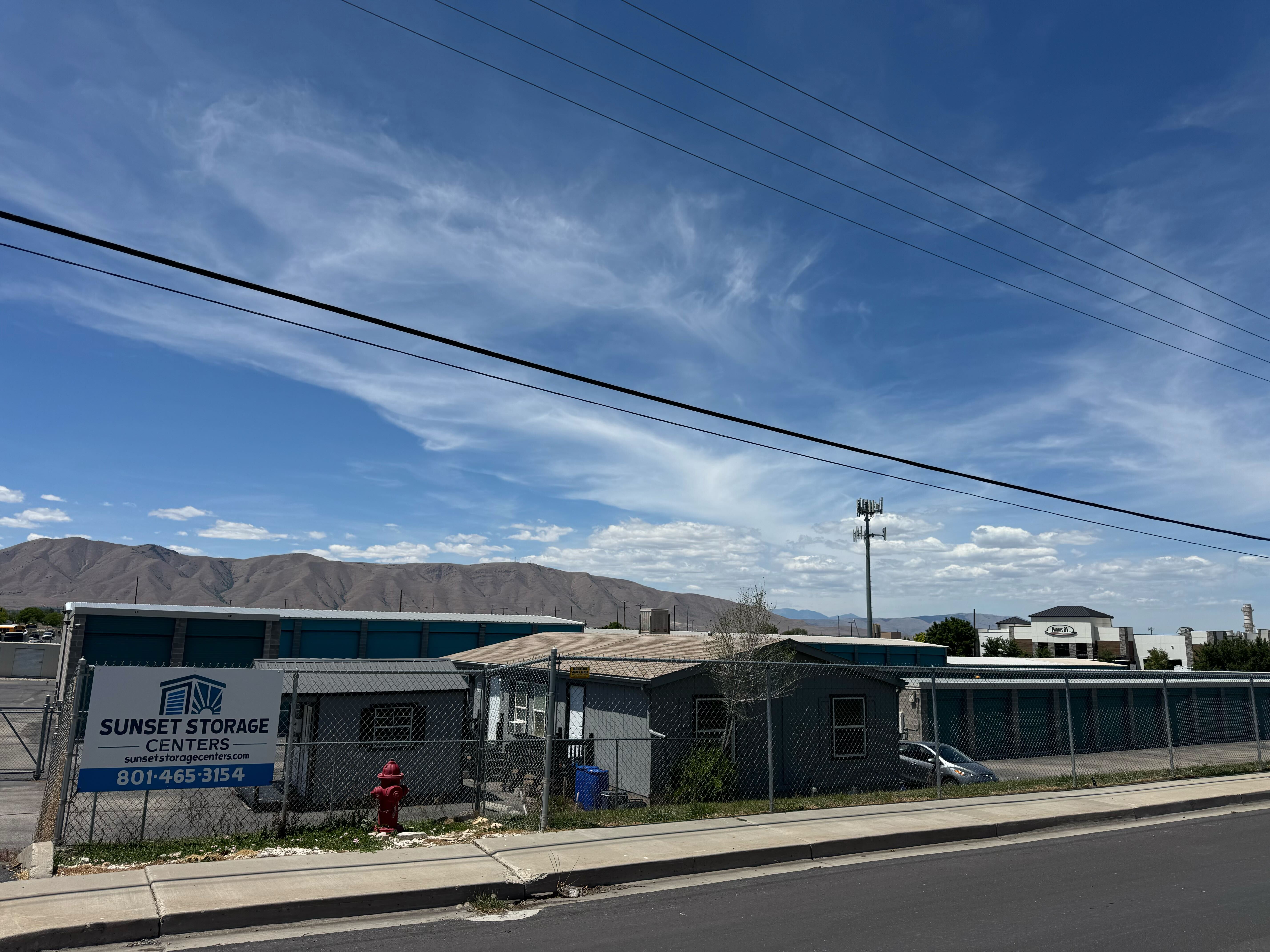 Drive-up loading access and lit aisles at Sunset Storage Centers in Payson