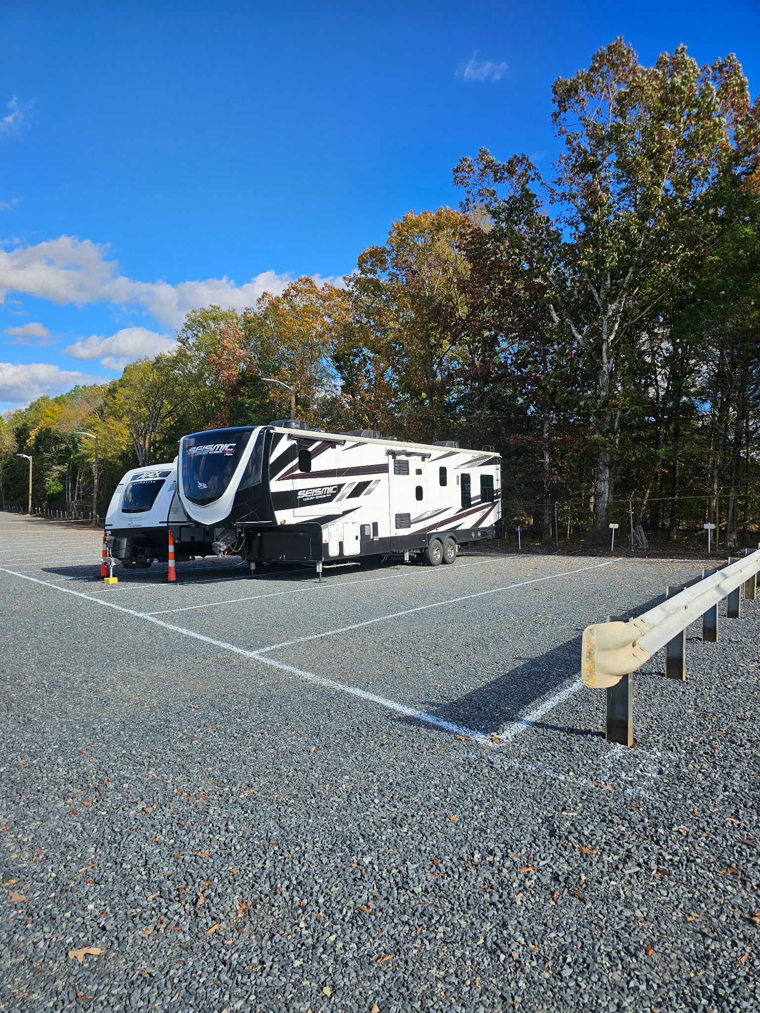 Secure gated outdoor parking with well-lit stalls for boats, RVs, and trailers at Total Space in Union County