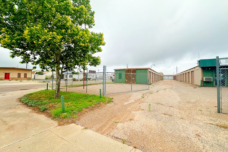 Fenced outdoor RV, boat, and trailer parking at Valora Storage in south Lubbock, Texas