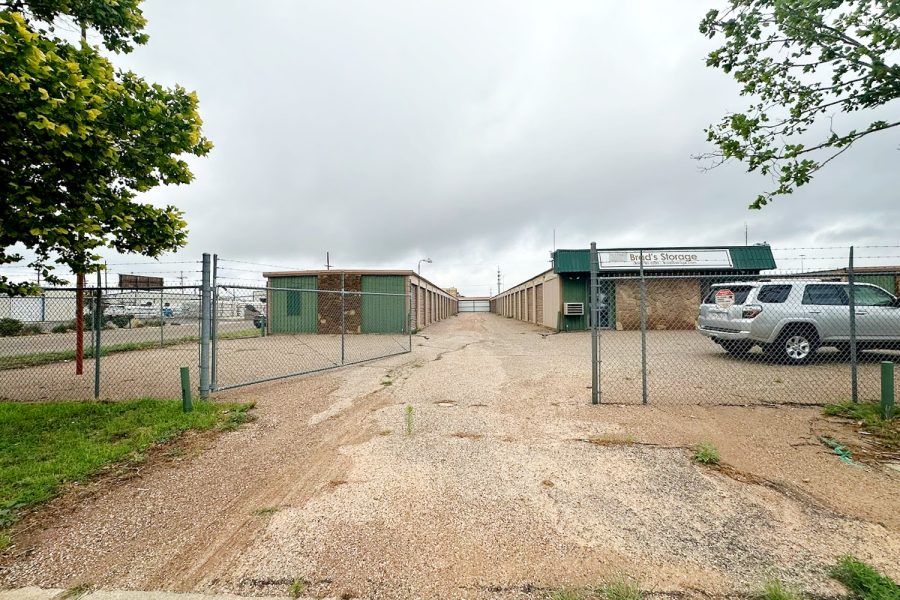 Gated keypad entry and fenced perimeter at Valora Storage Annex on Upland Avenue in Lubbock, Texas