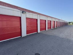 Fenced storage facility grounds at Yukon Self Storage for after-hours keypad gate access