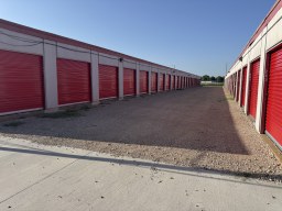 Well-lit storage lot ready for after-hours drive-up unloading in Yukon, OK